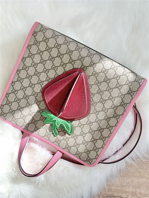 gucci strawberry tote|gucci bag with strawberry charm.